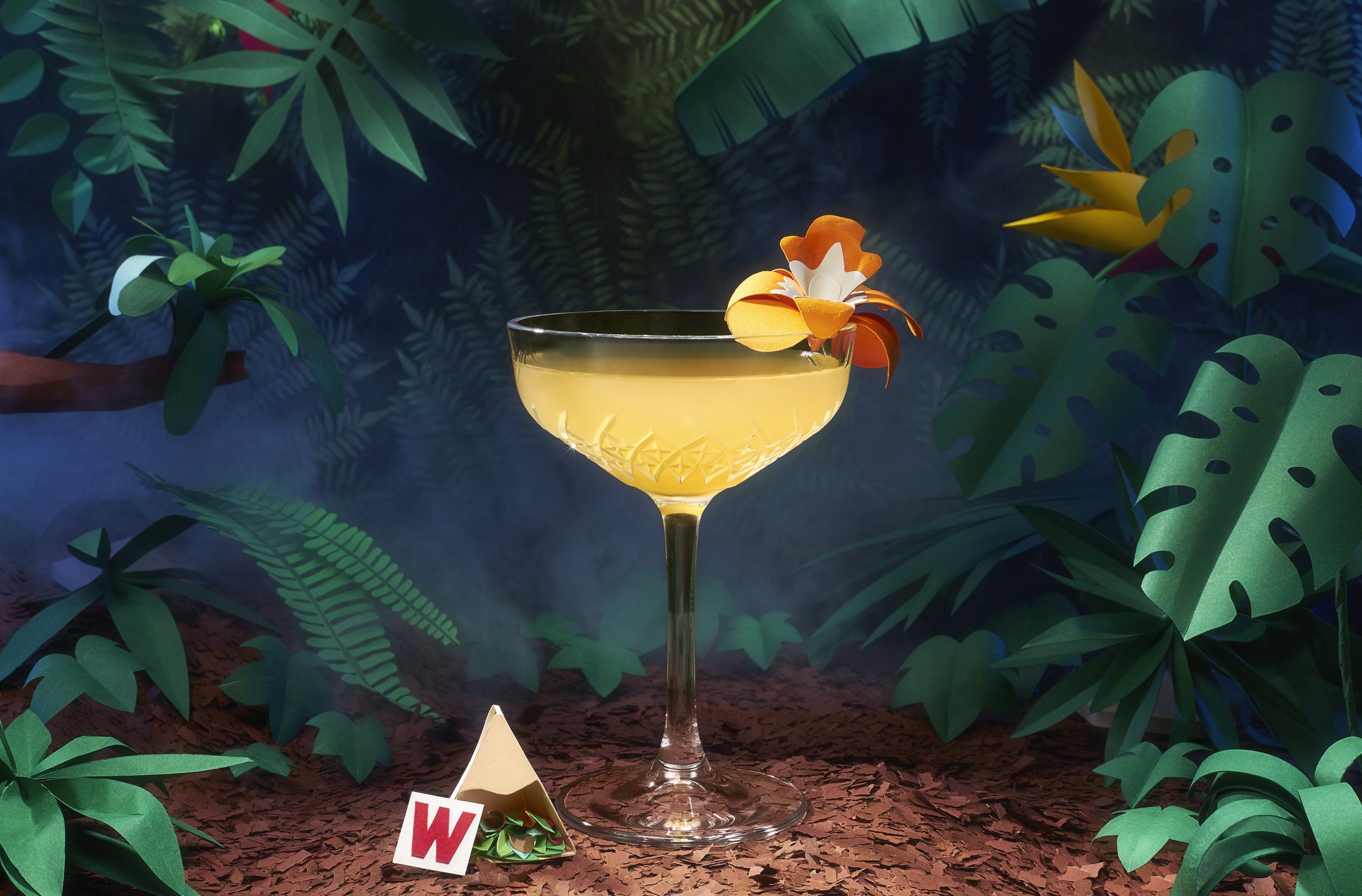 Campaign image of Asian Sensation with a cocktail and a sachet of Wissotzky tea